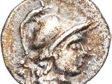 a silver coin with an image of a man wearing a hat