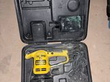 a tool in a case that is sitting on the floor