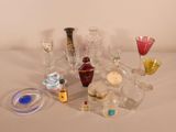 a lot of glass items that are sitting on a table