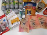 many different types of dog food and treats on the table