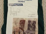 a picture of a pair of chairs wrapped in plastic