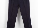 a black pants with gold buttons hanging on a hanger