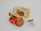 an orange toy truck with a crane on the back of it
