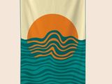 a tea towel hanging on a clothes line with a sunset in the background