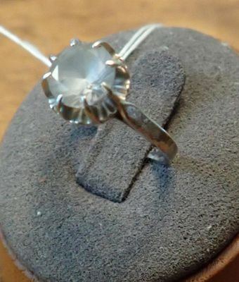a ring that is sitting on top of a stone