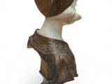 statue of a bust of a woman with a turban on her head