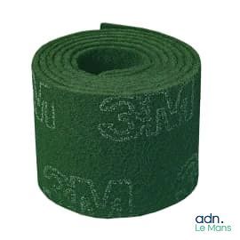 a roll of green cloth with writing on it