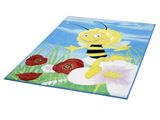 Le tapis est orné d'une abeille et d'une fleur en arrière-plan.