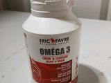 a bottle of omega 3 on a counter top