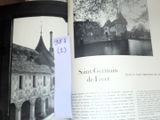 an open book with a picture of a castle on it