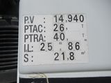 a sign on the side of a white truck that has numbers on it