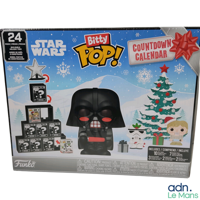 a box with a darth vader figure and a christmas tree
