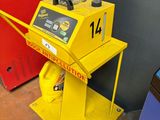 a yellow machine that is sitting on the floor
