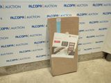 a cardboard box sitting on the floor next to a wall