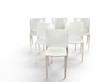 several white chairs are arranged in a circle on a white surface