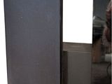 two speakers that are sitting next to each other