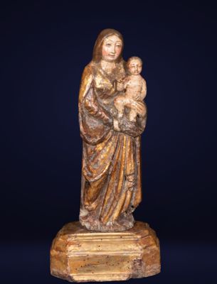 an image of a statue of a woman holding a child