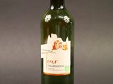 a bottle of wine that is sitting on a table