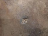 a close up of a metal object on a table