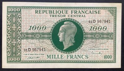 le recto d'un billet de banque français vert et blanc, sur lequel figure le portrait d'un homme