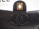chanel black leather clutch bag with gold hardware