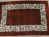 a picture of a rug with a design on it