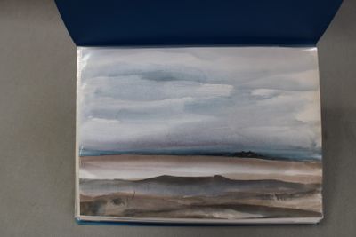 an image of a picture of a painting on a table