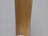 a piece of wood that has a sticker on it