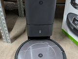 an image of a robotic vacuum cleaner sitting on the floor