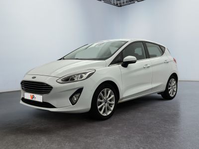 the new ford fiesta is parked in the showroom at the showroom