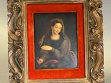 tableau représentant une femme en robe rouge, assise dans un cadre doré