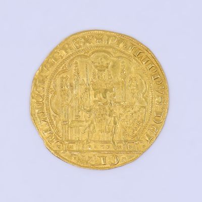 l'image d'une pièce d'or sur laquelle figure l'image d'un homme