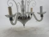 a chandelier that is hanging from the ceiling
