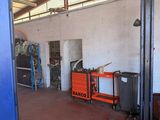 an image of a garage with a lot of tools
