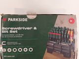 a box of screwdriver and bit set sitting on a table