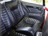 a black leather seat in the back of a car