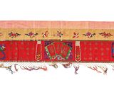 an image of a close up of a red and yellow rug on a white background