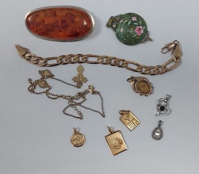 a lot of jewelry that is laying out on the table