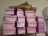 a lot of pink boxes stacked on top of each other