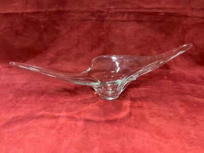 an image of a glass bowl on a red cloth