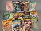a bunch of comics are stacked on top of each other