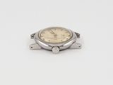 an image of a watch sitting on top of a white surface