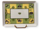 yellow and green tray with monkeys and palm trees on it