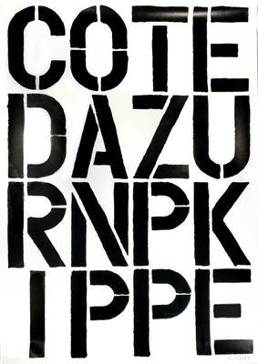 une photo en noir et blanc d'un panneau sur lequel on peut lire « coote dazu rnpk hippie »