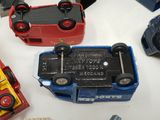many toy cars that are sitting on a table