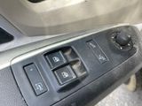 a close up of a car ' s dashboard with a key board