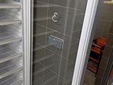 an image of an open refrigerator in a kitchen