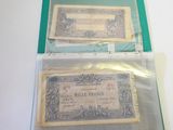two old french bank notes in a plastic bag
