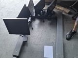 three laptops sitting on the ground next to each other