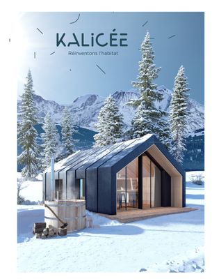 la couverture d'un magazine sur laquelle figure la photo d'une cabane dans la neige